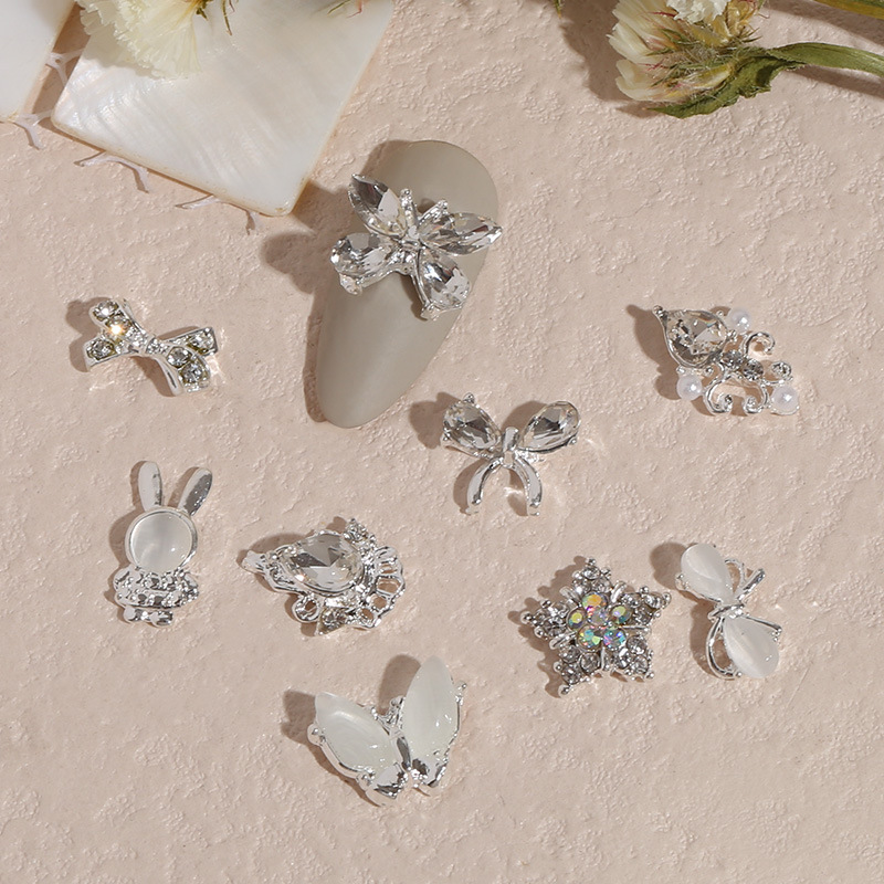 Transfronterizo nueva manicura mariposa plata metal aleación plana estilo japonés Internet celebridad rhinestone DIY accesorios joyería al por mayor