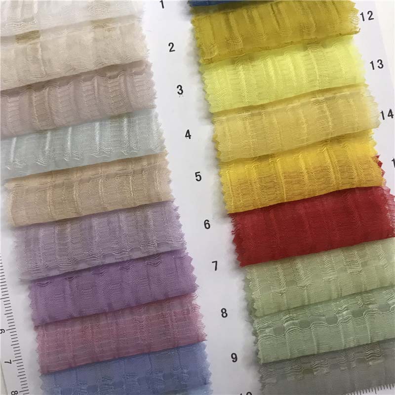 天丝圆孔皱面料59个颜色现货供厂家直销上衣连衣裙面料8027741