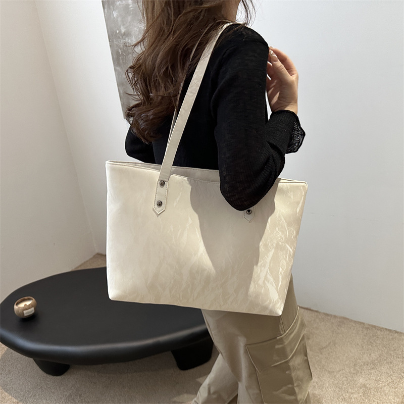 Bolsa de viaje de clase de estudiantes para mujeres 2024 nueva moda primavera hombro brazalete bolsa de alta capacidad de gran tamaño bolsa de mano