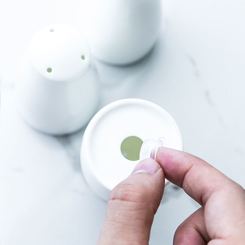 Transfronterizo de dos latas de sal y pimienta de cerámica suministros de cocina en polvo esparcidor botella de condimento tarro