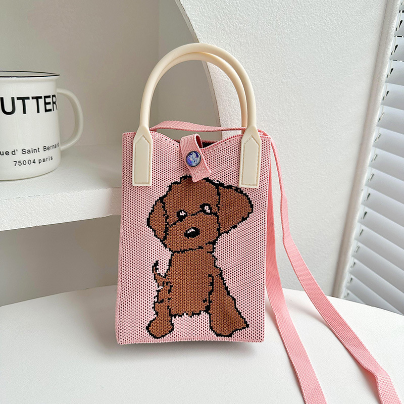 Caramelo de cachorro rojo (con manos)