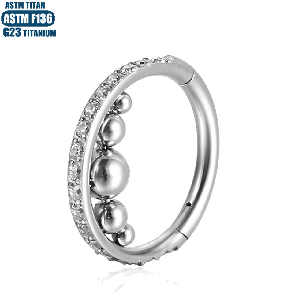 Silver pointed spike labret stud material detail