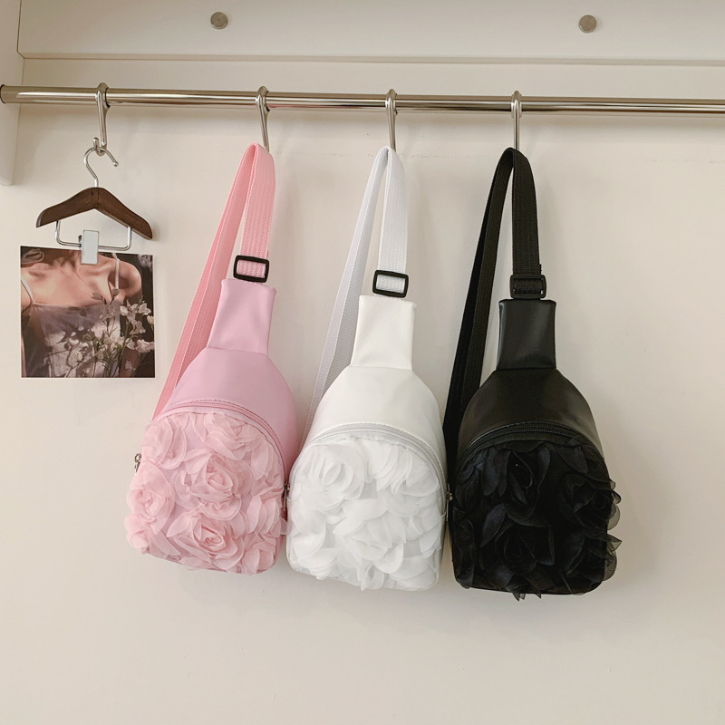 Dolce encaje rosa flor de bebé bolso de pecho color sólido pequeño fuera de la bolsa de cambio PU 2026 bolso infantil transfronterizo
