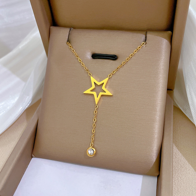 Collier chaîne minimaliste avec pendentif étoile à pompon_voghion.com