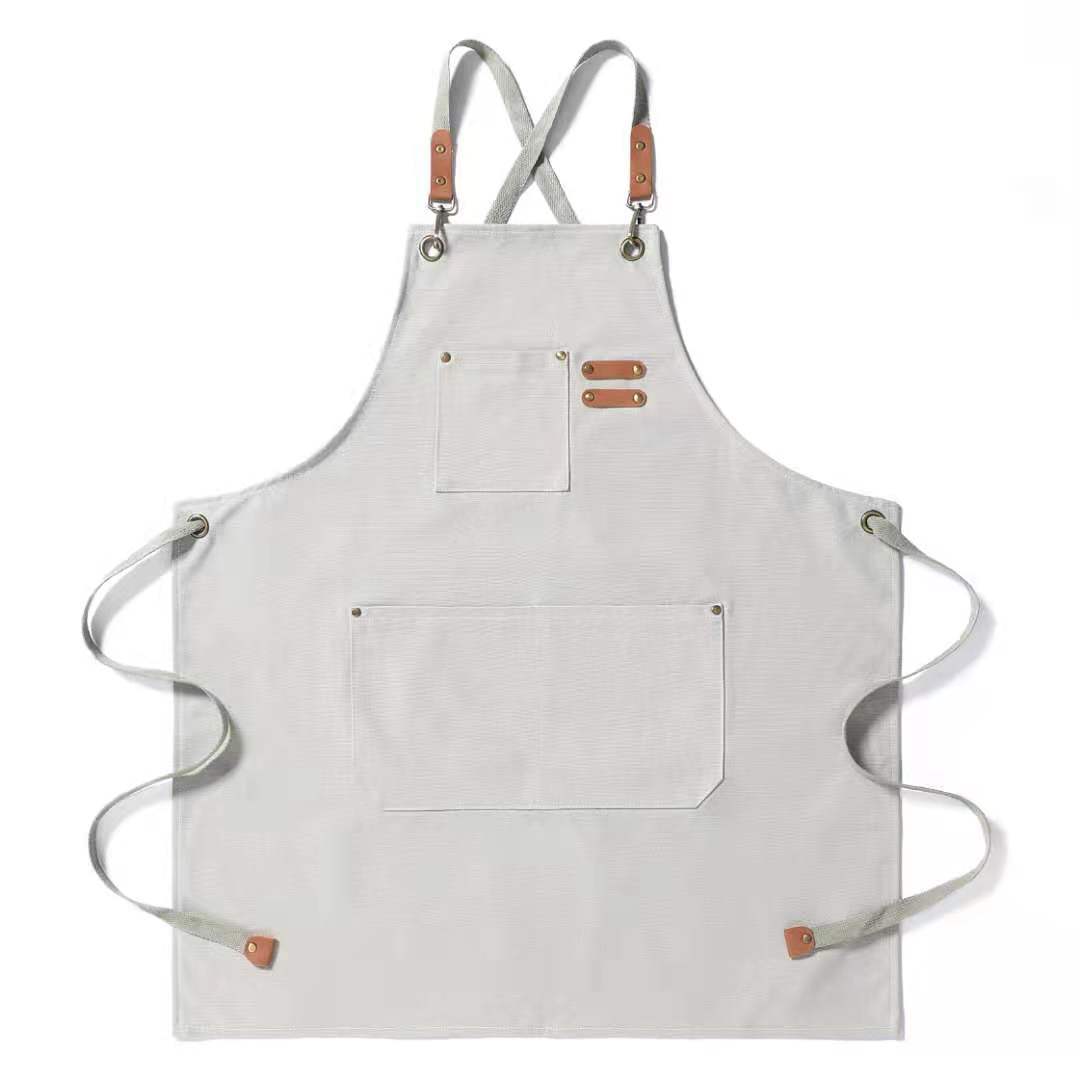 Delantal de algodón de lona impermeable y a prueba de aceite transfronterizo, delantal de trabajo de mezclilla de jardinería de cocina de cafetería al por mayor