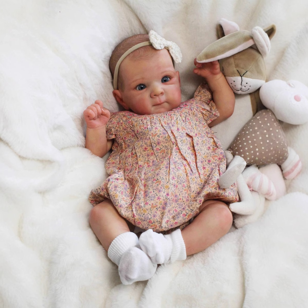 Como se muestra en la imagen (sin incluir juguetes de peluche)