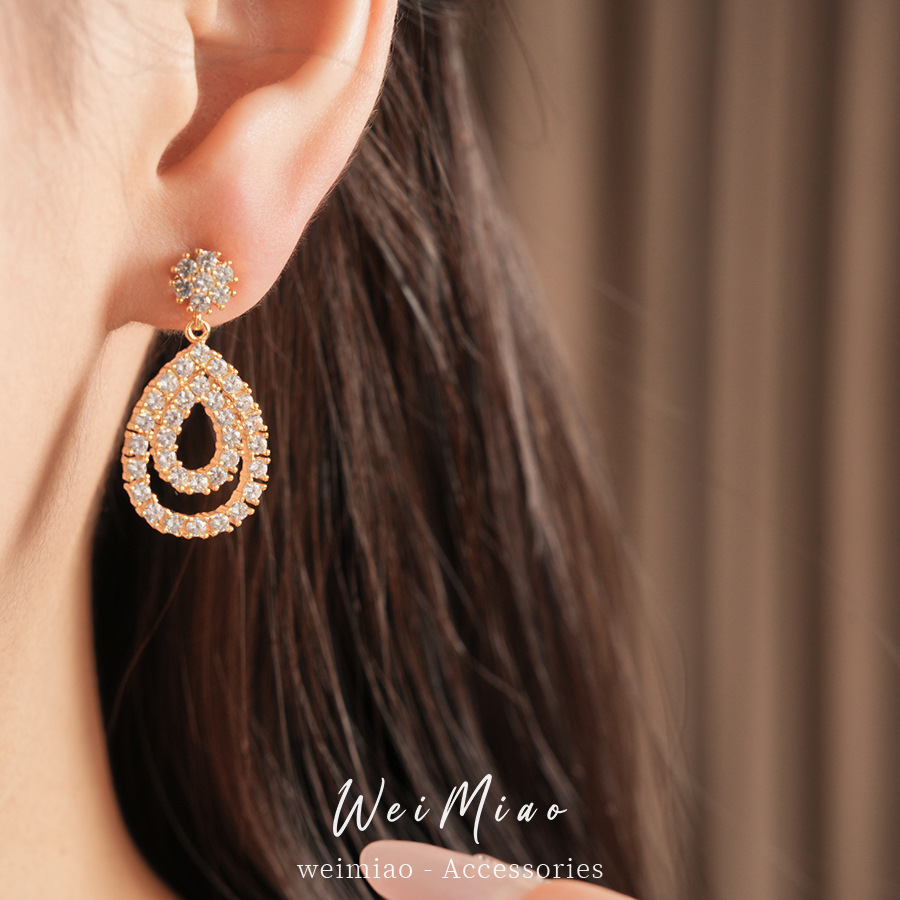 18k oro real chapado aguja de plata de piedra de silicio gota de agua personalidad temperamento pendientes de moda ligero lujo alta sensación de auriculares