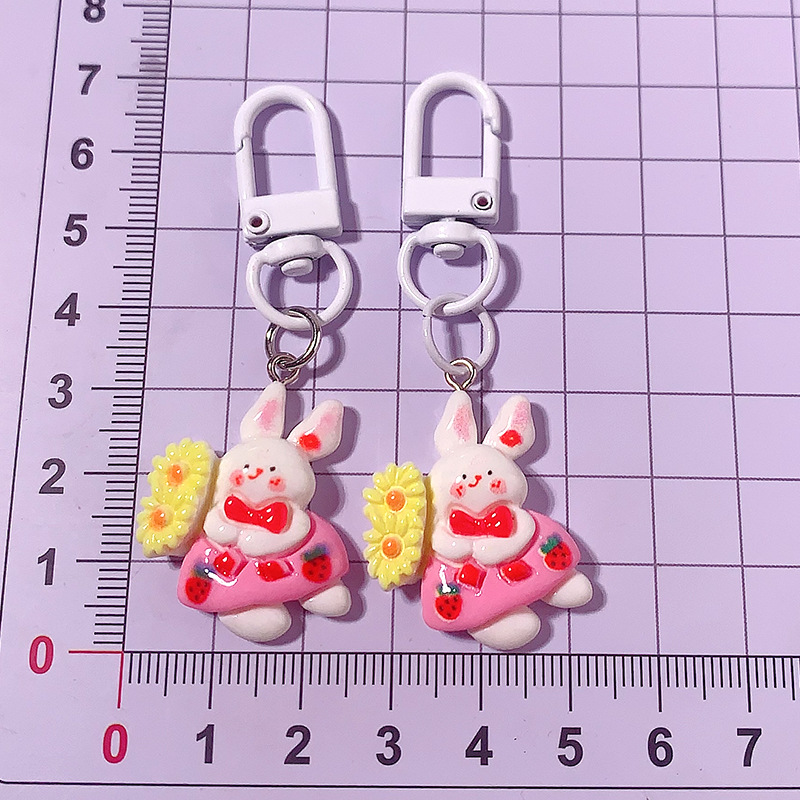 Cartoon verano viaje conejo llavero in dulce chica amiga regalo mochila colgante accesorios de resina, etc.