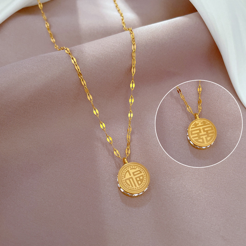 Collier femme symbole fu double face en or véritable bijoux_voghion.com