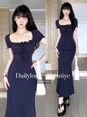 女性の夏の小柄なギャルは身を修めて腰を収めてやせている深藍のワンピースの純欲のお母さんの風は尻の魚の尾の長いスカートを包みます。
