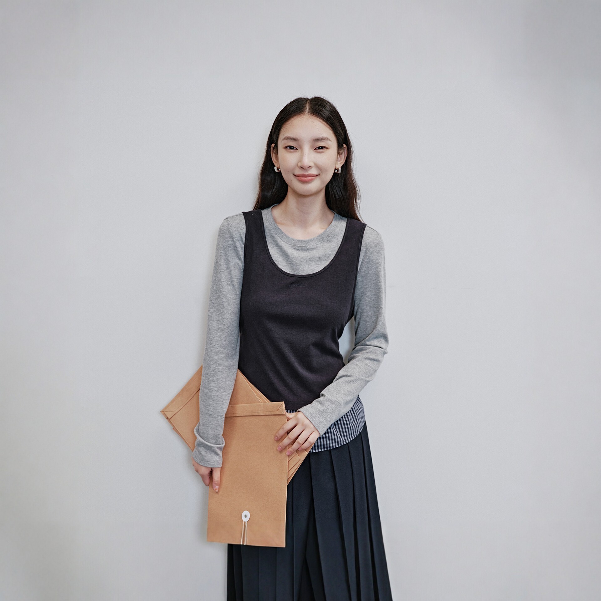 Color-blocked faux two-piece knit top for women, 2026 autumn new arrival, Korean style long-sleeved vest, spliced design top