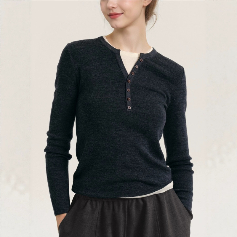New autumn and winter collection: a slim-fit, black, two-piece-style knitted top with a Henley collar, perfect for layering and creating a chic look