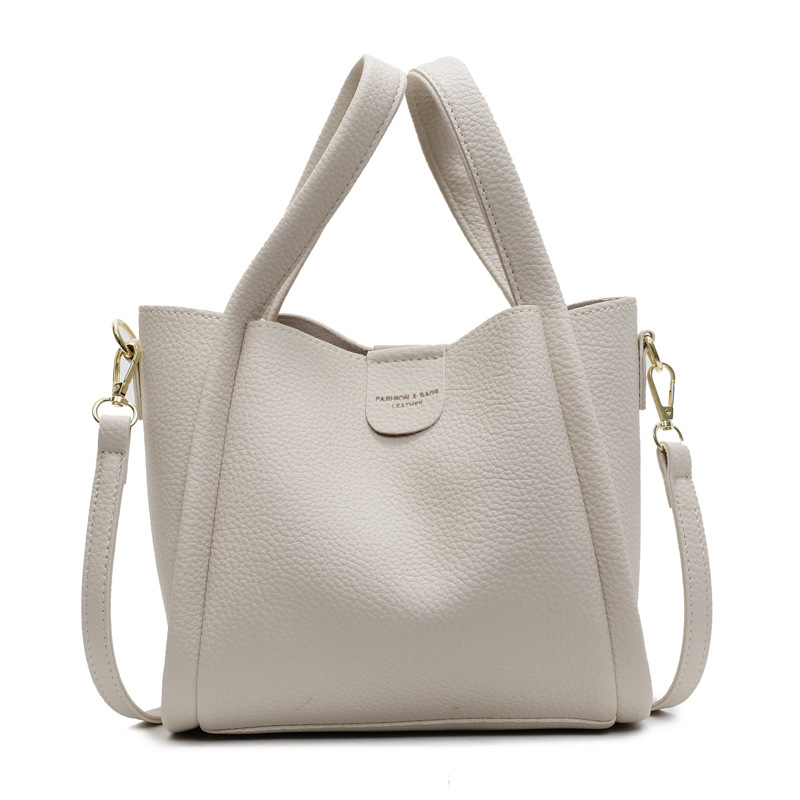 Comercio exterior ocio retro bolso de cubo de mano 2025 nuevo versátil simple bolso de hombro de alta calidad textura mochila