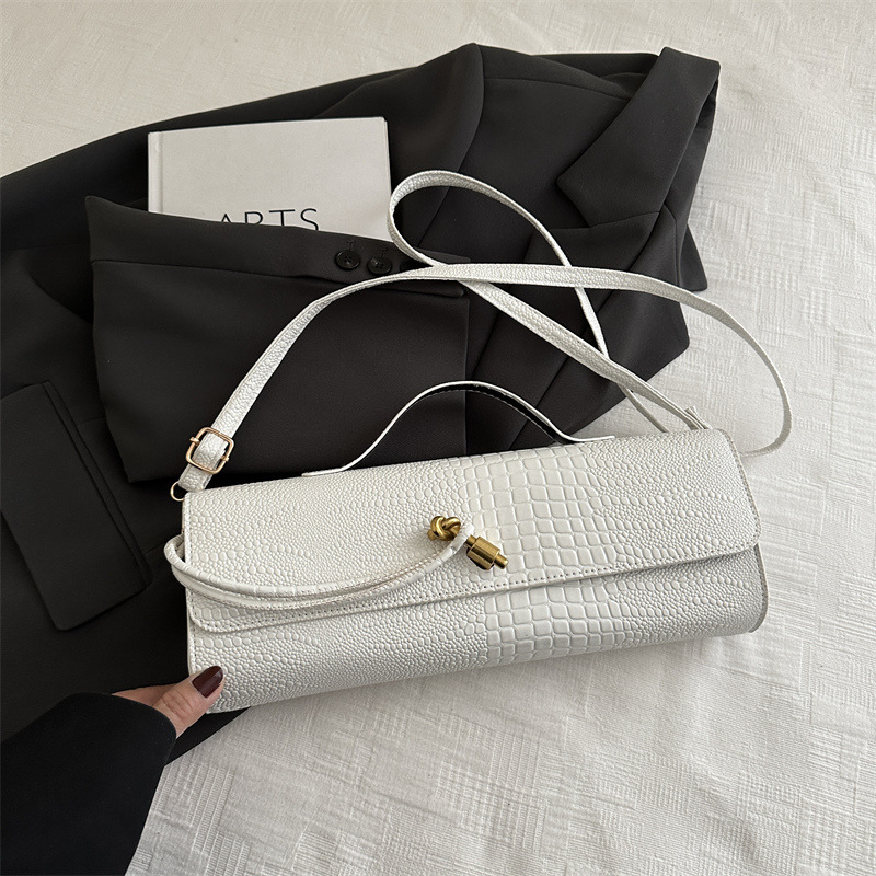 Nuevo bolso mujer moda europea y americana 2025 verano casual pequeño bolso cuadrado personalidad moda estilo occidental bolso de mensajero de un solo hombro mujer