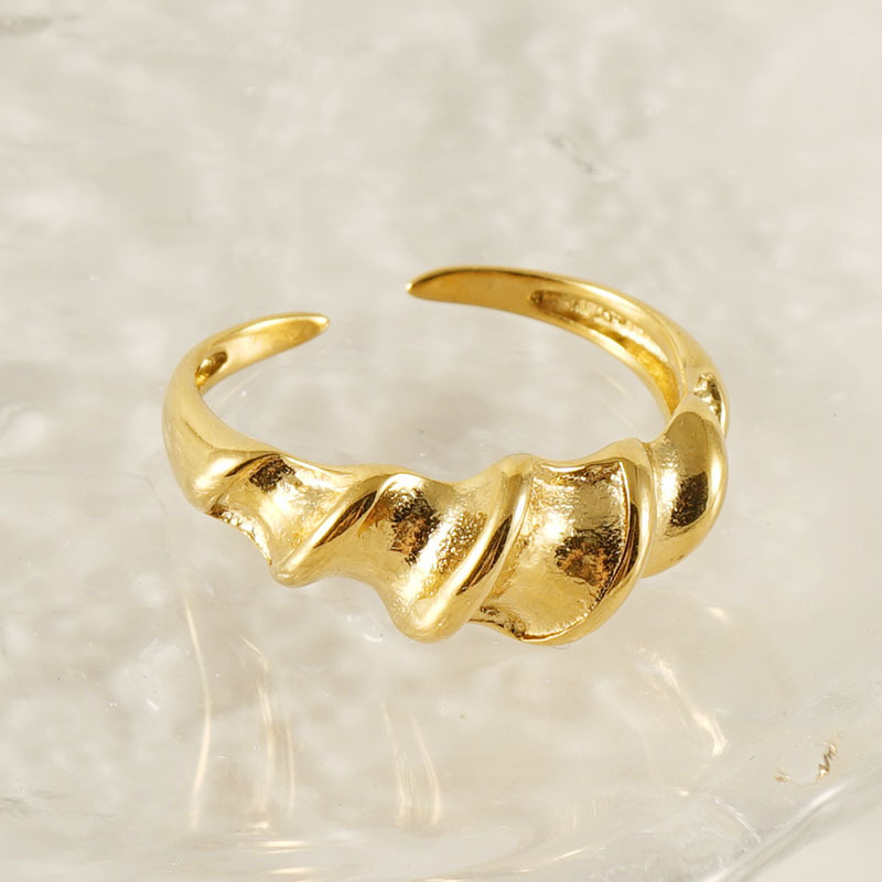 Anillo de torsión ajustable de acero de titanio francés transfronterizo hembra anillo de torsión de hilo irregular de personalidad simple europea y americana