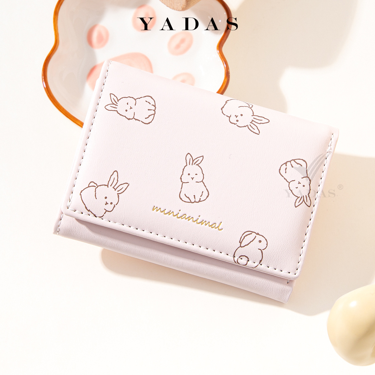 Monedero japonés simple para mujeres corto delgado y compacto cartera de estudiantes plegables nueva cartera de nicho encantadora