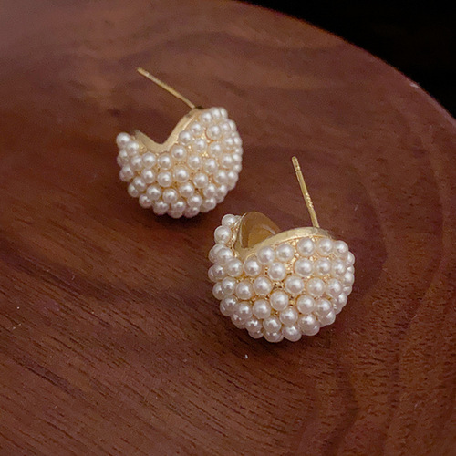 The same stylish and elegant pearl hoop earrings with a unique design, fashionable, cute, and a high-end vibe.