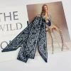 Black silk scarf + silver trouser chain