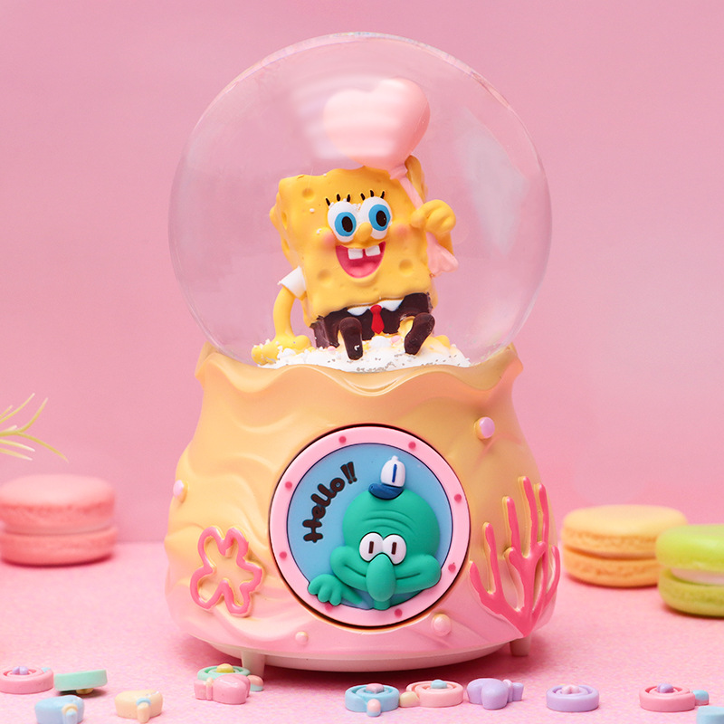 Animado encantador con la misma caja de música de bola de cristal de Bob Esponja resina creativa brillante nieve flotante caja de sonido boutique