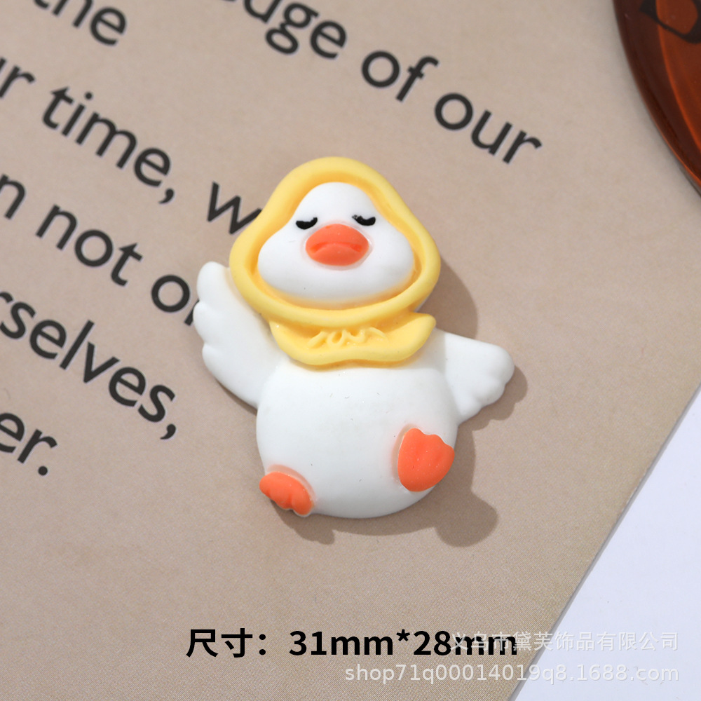 Sombrero de paja al por mayor de pato de celebridad de Internet de dibujos animados de cabeza torcida DIY accesorios de resina teléfono móvil Shell accesorios para el cabello agujero hebilla de zapato