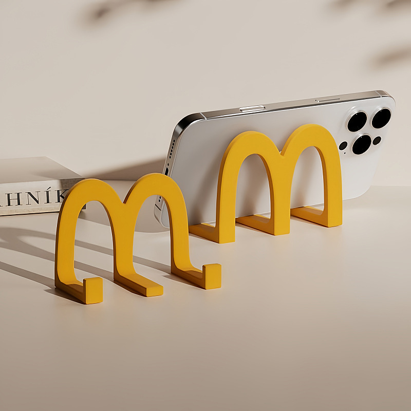 Soporte para teléfono móvil de escritorio McDonald's, pequeños adornos, oficina creativa, marco para teléfono móvil, persecución, espectáculo de persecución, repelente de pájaros colgante