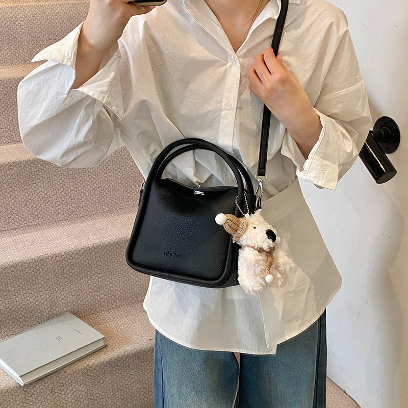 Bolso de cesta de verduras de estilo caliente de comercio exterior para mujer 2025 nuevo bolso de hombro casual simple bolso de cubo de aire occidental salvaje