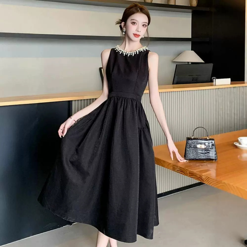 Europa estación chaleco negro vestido de mujer verano lujoso ligero Hepburn vestido de noche con perlas de estilo de alto rendimiento vestido largo