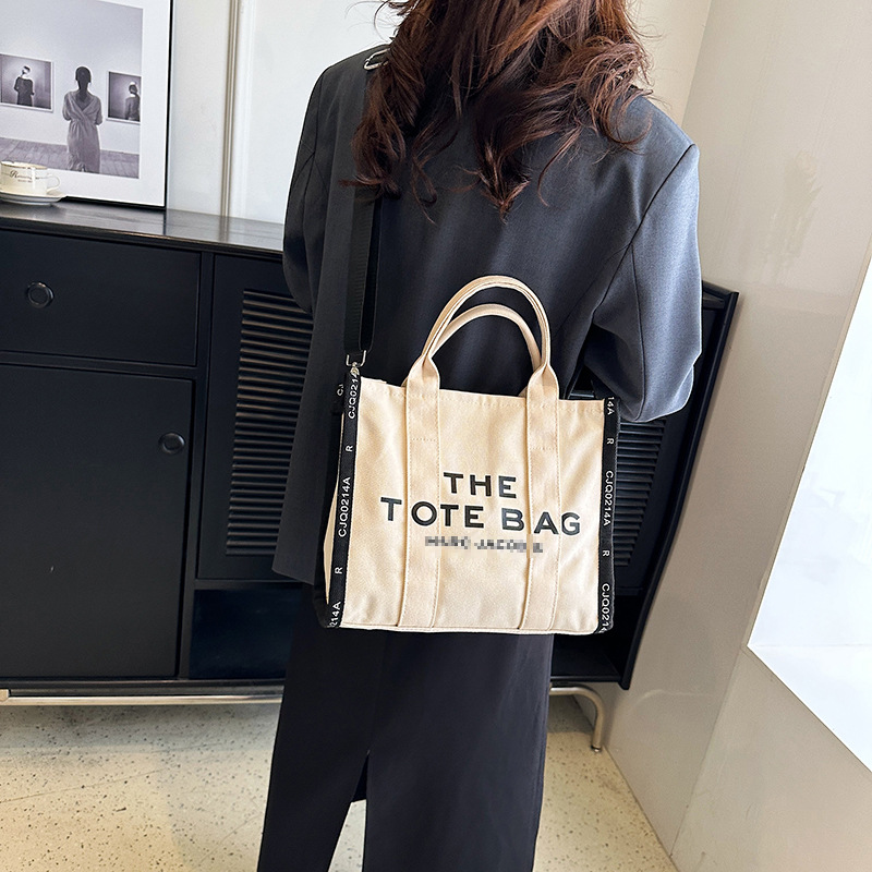 Bolso de hombro transfronterizo para mujer de gran capacidad 2025 bolso diagonal de viajero de letras simples de invierno bolso de lona de diseño de nicho