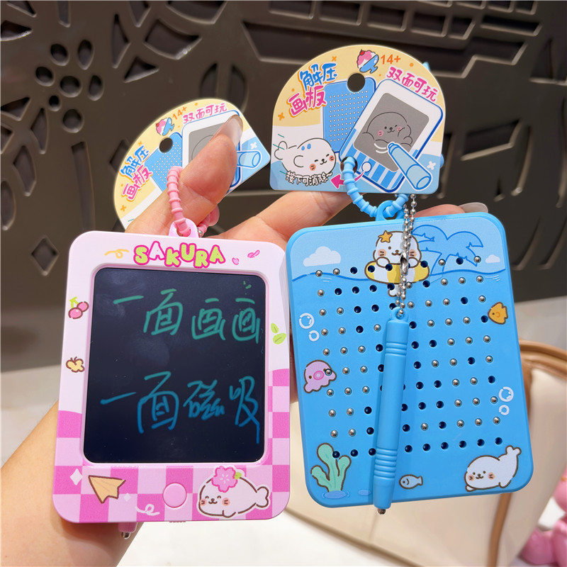 Trendy and adorable, this fun and stress-relieving double-sided magnetic bead drawing board keychain is perfect for writing and decorating your bag