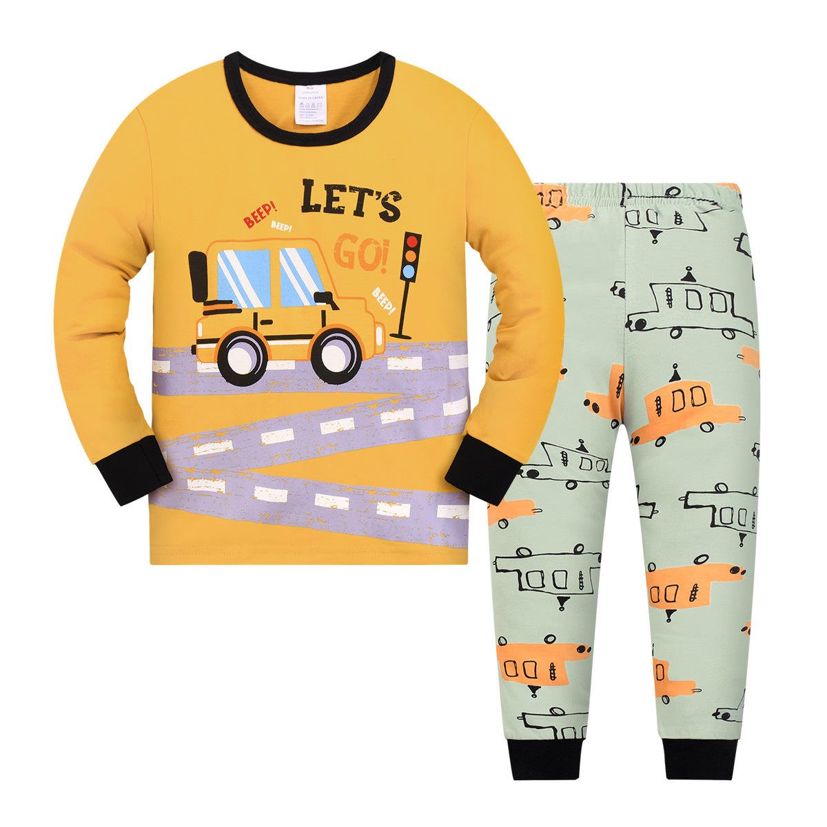 2024 otoño y invierno nuevo comercio exterior conjunto de ropa de casa para niños estilo europeo y americano impresión de dibujos animados niños pijamas de cuello redondo delgados