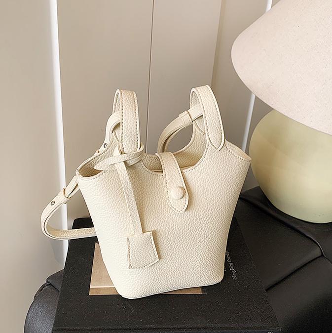 Bolsos de cesta de verduras populares de este año para mujer 2025 nuevo bolso de hombro súper caliente bolso de cubo de ocio simple
