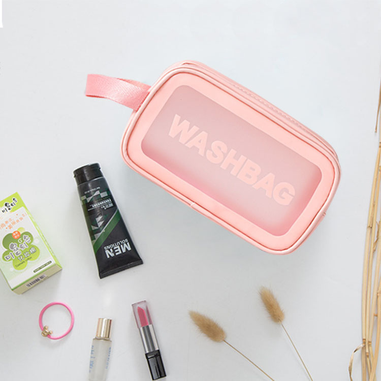 Handheld capacious cosmetic bag