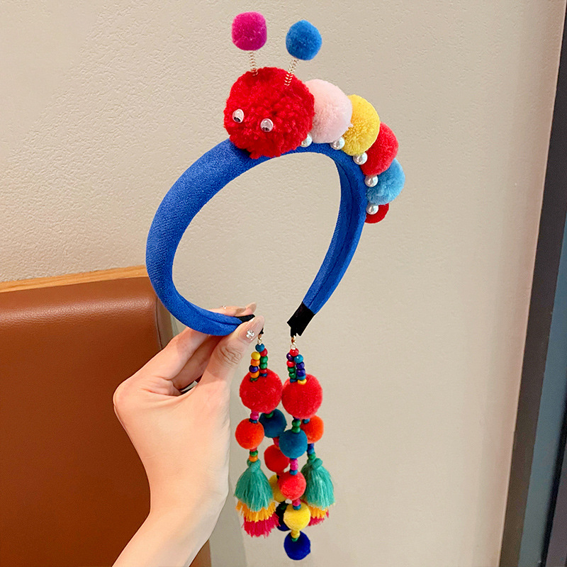 Blue headband with tassels