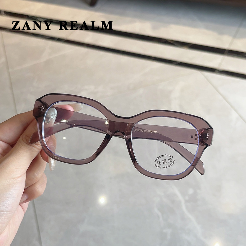 Nuevo estilo coreano retro ojo de gato marco grande anti-azul gafas de luz cara redonda versátil beige uñas marco negro gafas de Marco liso fabricante