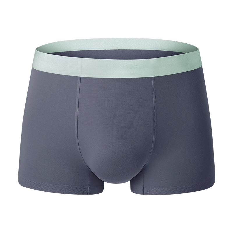 Pantalones de moda de color contrastante, delgadas y sin marcas de cintura media, pantalones de pierna suaves y cómodas, pantalones de entrepierna transpirables para hombres.