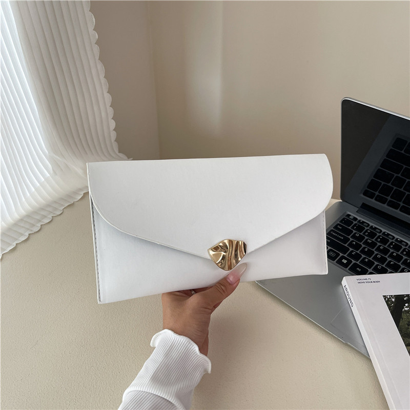 Tendencia de estilo extranjero nueva bolsa de sobres de gran capacidad de otoño 2025 moda casual simple estilo coreano bolso de mano de mujer