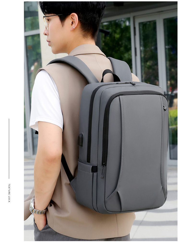 Large-capacity backpack men's new USB charging casual student school bag business commuting simple computer backpack_voghion.com