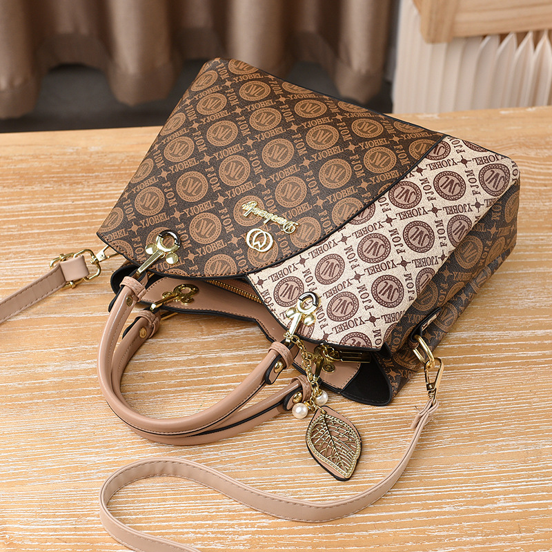 Bolso bandolera para mujer nuevo versátil bolso de mamá moda de verano bolso de mano de un solo hombro 2025 fabricante comercio exterior elegante para mujer.