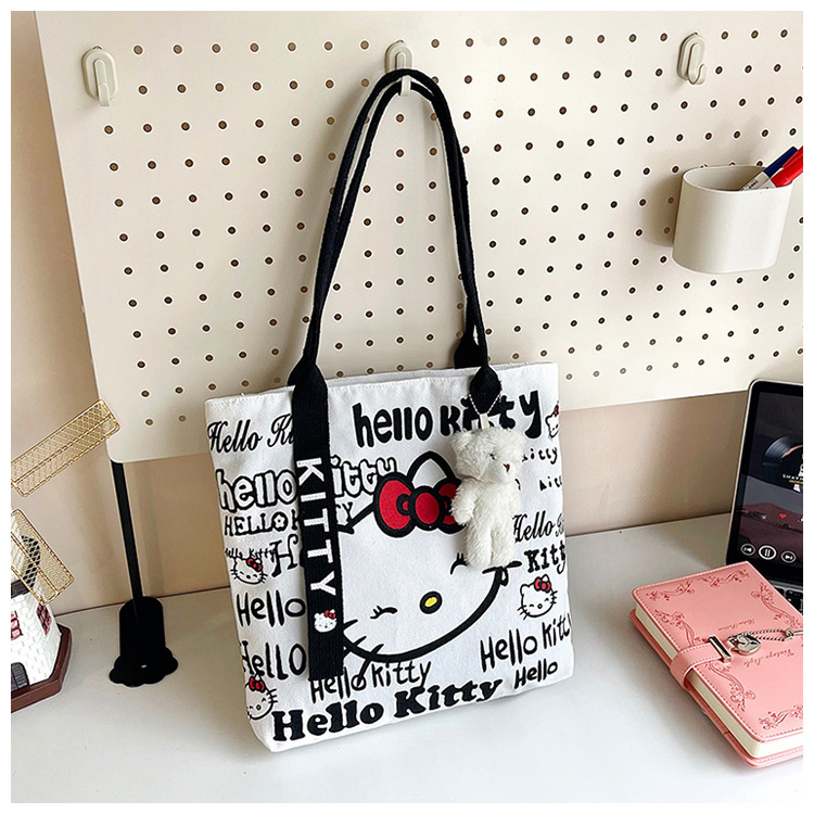 The new fashionable cartoon canvas bag, simple and versatile tote bag, cute commuting single-shoulder tote large bag, is selling well across borders undefined