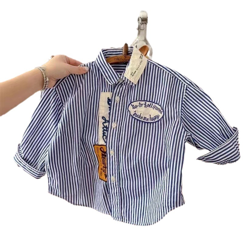 Camisa para niños 2024 otoño nuevos niños y niñas estilo coreano algodón a rayas camisa casual Camisa de manga larga de solapa de bebé