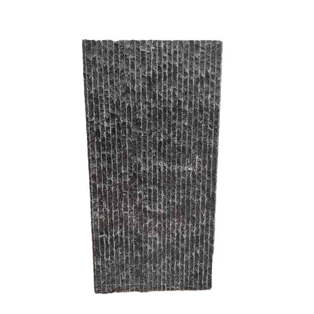 Hand-cut bluestone construction project paving roadside stone square scene area chisel road surface stone bluestone