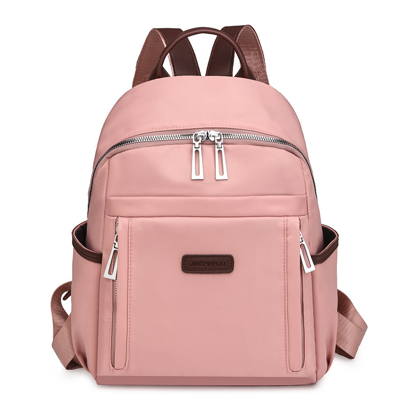 Venta al por mayor transfronteriza 2024 invierno nuevo estilo casual damas mochila de nailon simple y versátil mochila de viaje ligera marea