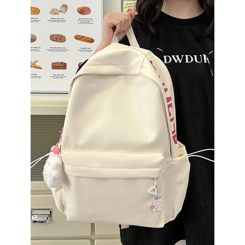 Mochila de gran capacidad para estudiantes de secundaria femenina simple y versátil para estudiantes de secundaria japonesa mochila de diseño