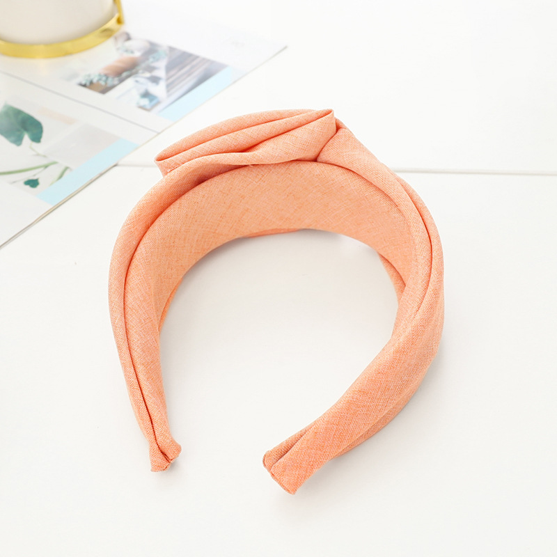 Korean Solid Color Wide-brimmed Fabric Cross-folding Headband Wholesale Nihaojewelry display picture 11