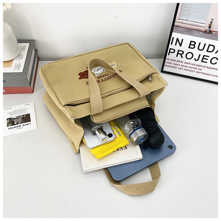 New wholesale fashionable and high-quality canvas handbag, simple and portable, easy to carry for going out, versatile lunch box and bento bag undefined