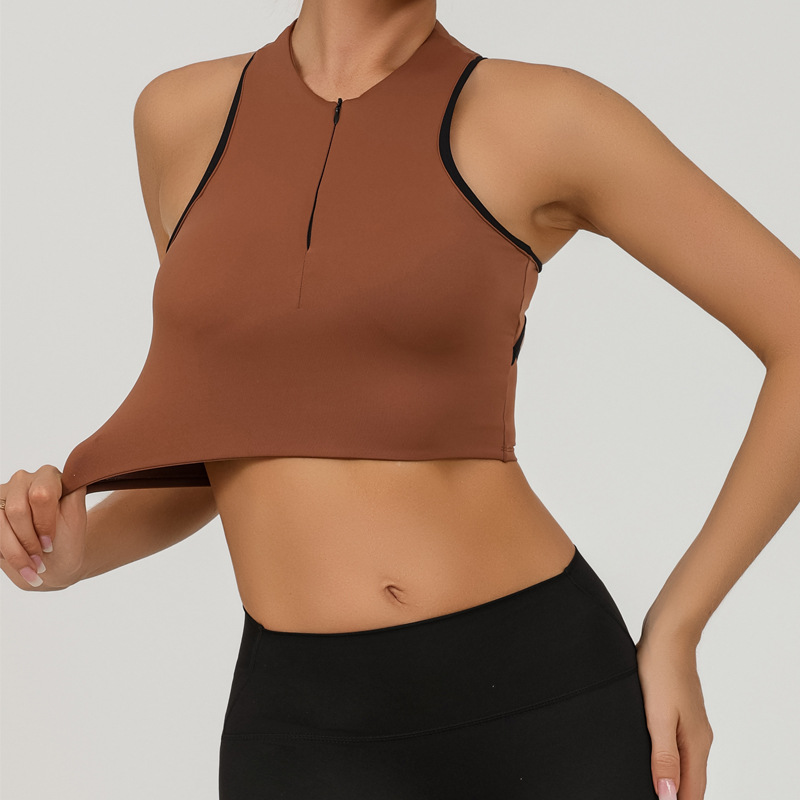 Chaleco de yoga deportivo europeo y americano personalizado para mujer con cremallera envuelta en el pecho a prueba de golpes y contraste de color fitness de secado rápido