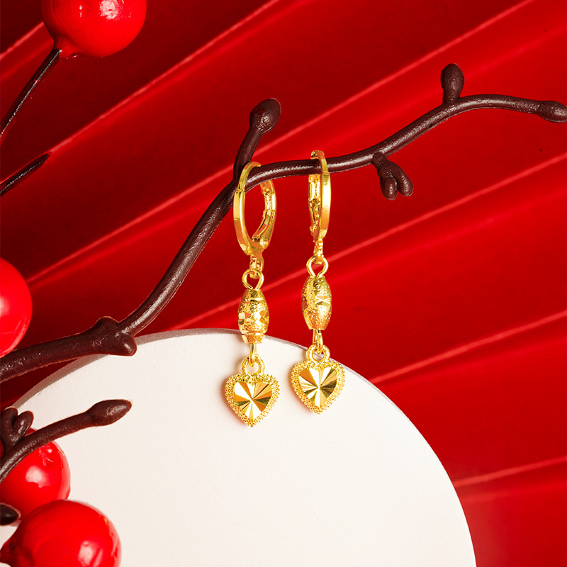 Arena oro amor pendientes de las mujeres de aleación de cobre melocotón corazón pendientes estrella de alto grado en línea popular en vivo suministro al por mayor