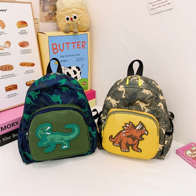2025 nueva mochila de dinosaurios infantil impresa de dibujos animados encantadora mochila para estudiantes de jardín de infantes
