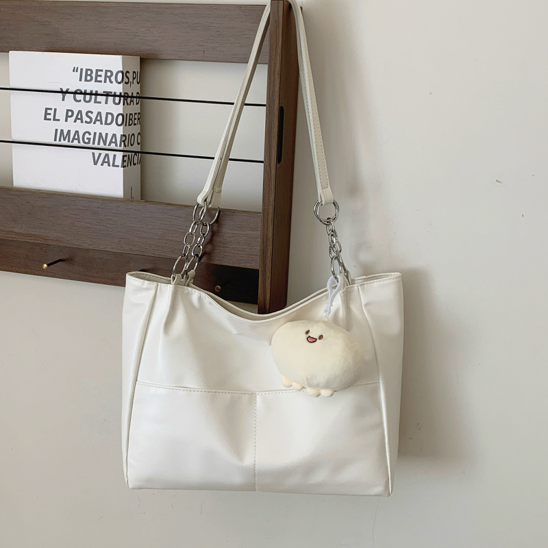 Alta sensación de bolso grande para mujeres 2024 nueva moda de verano de moda de gran capacidad de transporte bolsa bolsa de hombro de textura de mujer