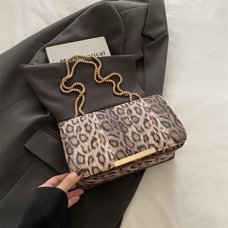 Bolsos de textura de leopardo de alta calidad para mujeres 2024 nueva moda bolso de cadena de hombro para mujeres ins zwang nicho bolso de mochila universal